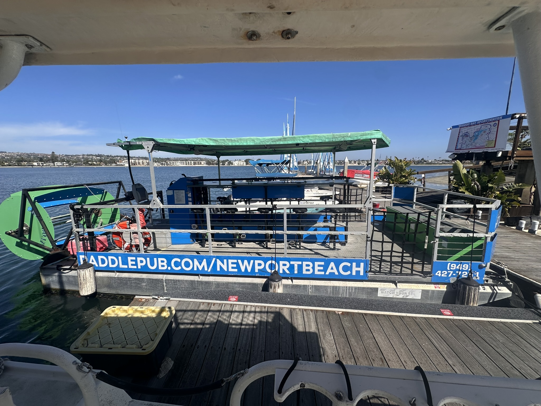 Paddle Pub vessel side view at dock